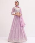 Women Embroidered Flared Lehenga Choli Set with Dupatta