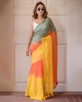 revangi_green_women_woven_saree_with_contrast_border.jpg
